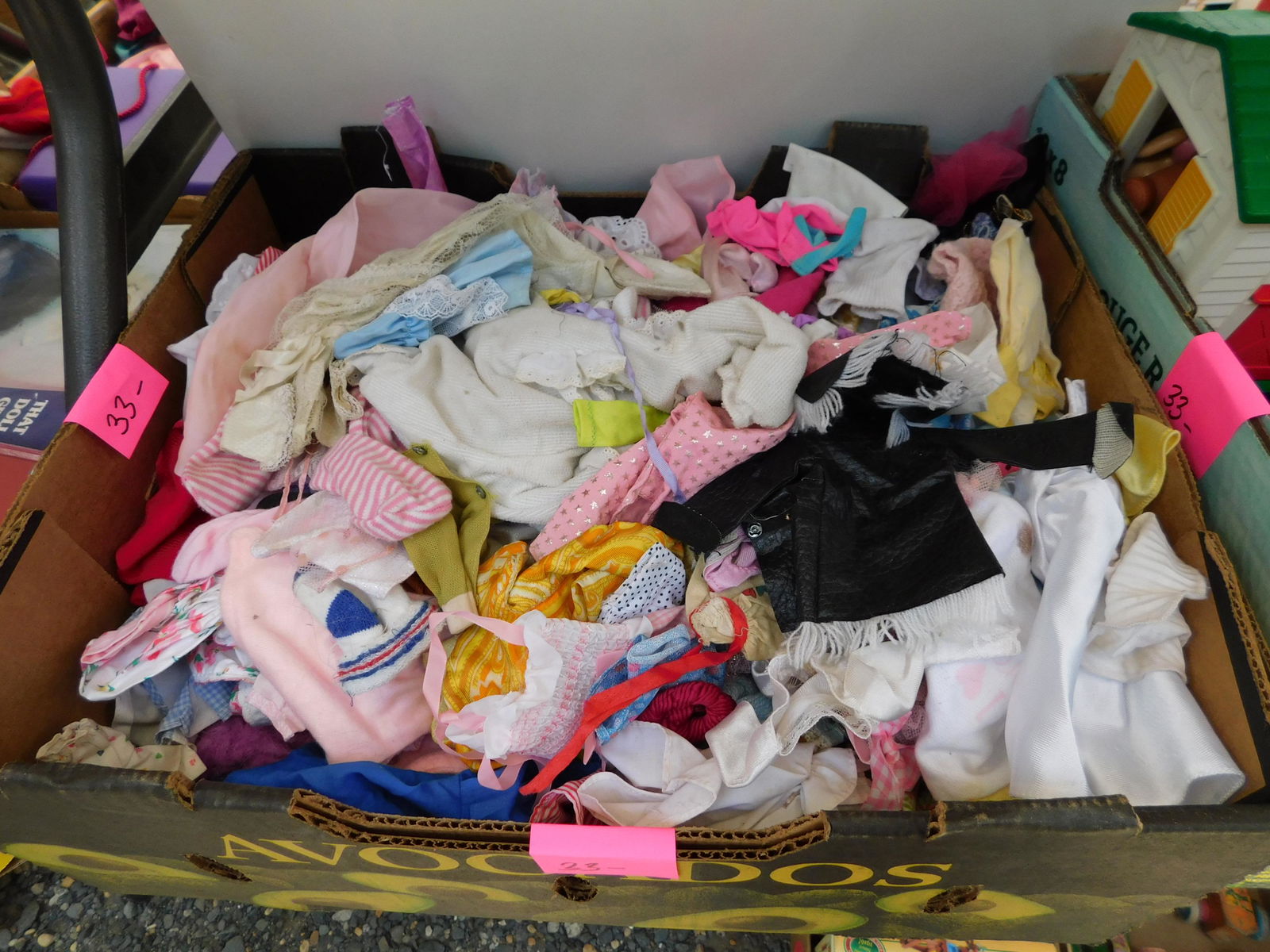 Large Lot of Doll Clothing: Large lot of doll clothing. You are bidding at a live sale. Please read the terms and conditions. This sale will be broadcast live on sale day with full descriptions of each lot being sold, as well as