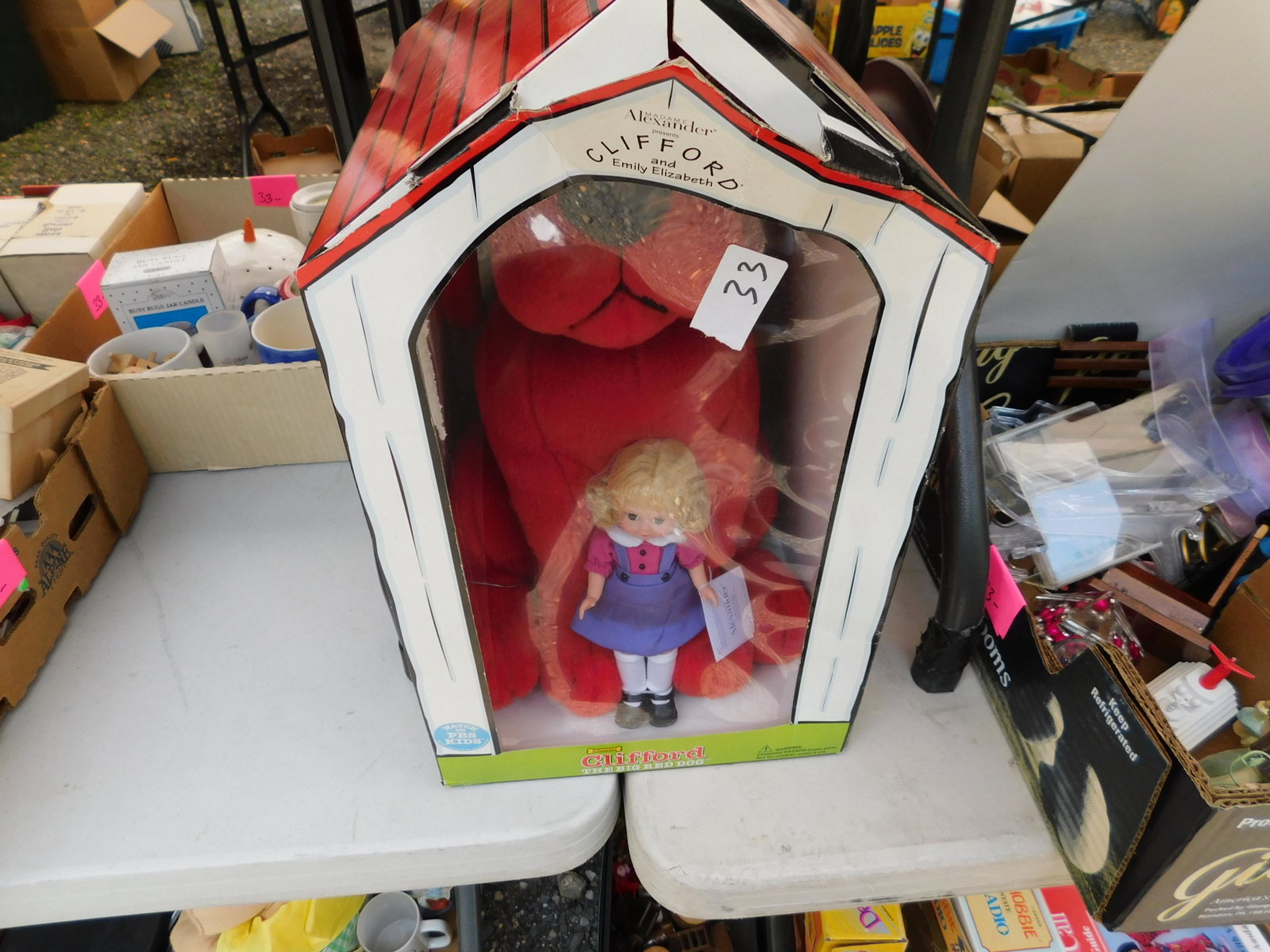Madame Alexander Clifford and Emily Elizabeth: Madame Alexander Clifford and Emily Elizabeth in original box. You are bidding at a live sale. Please read the terms and conditions. This sale will be broadcast live on sale day with full descriptions