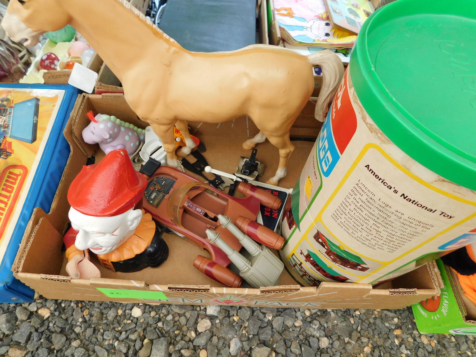 Lot of Misc. Toys: Lot of misc. toys including Lincoln Logs, a motion bank and more. You are bidding at a live sale. Please read the terms and conditions. This sale will be broadcast live on sale day with full descripti