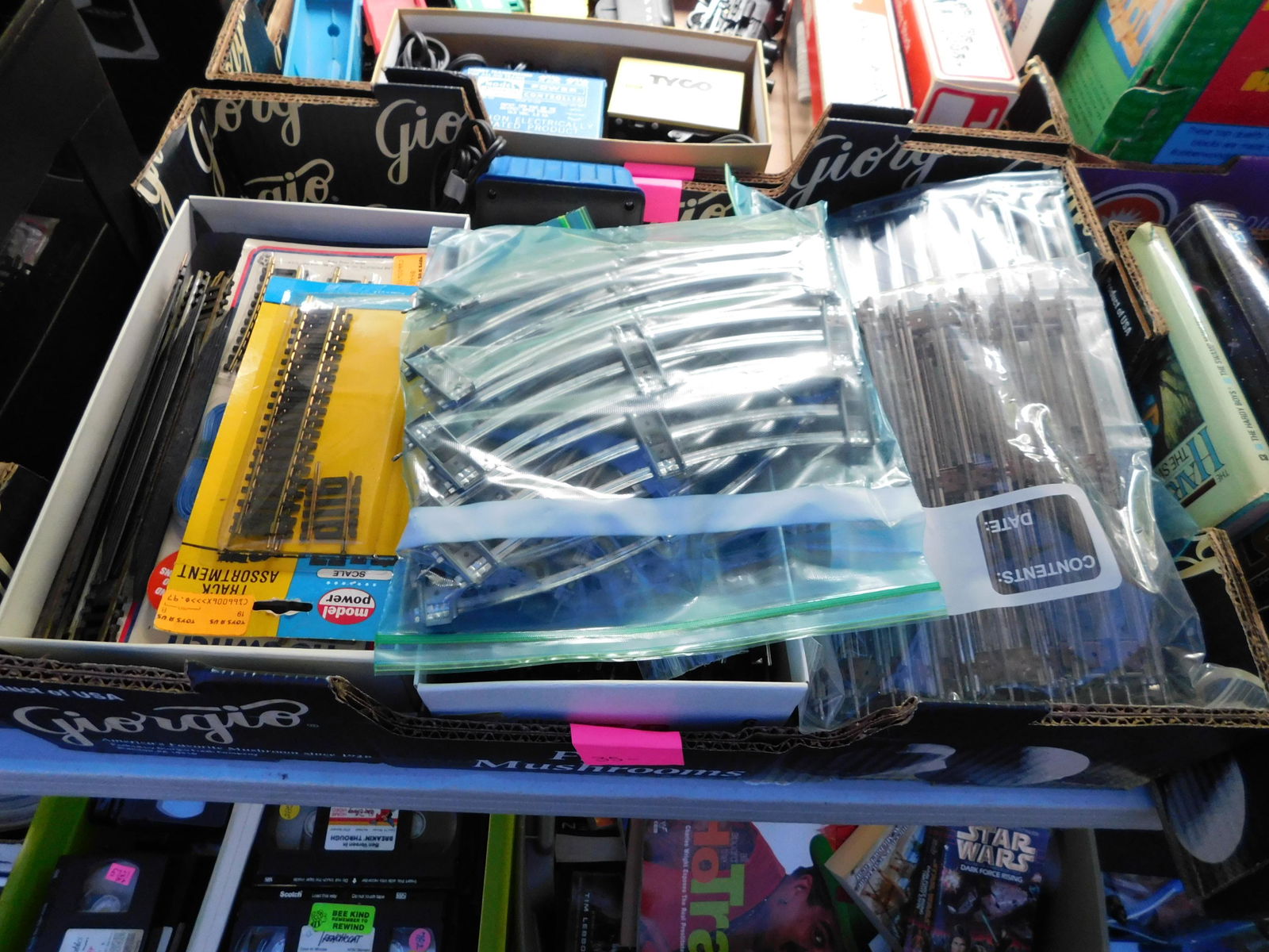 Lot of HO Track: Lot of HO track. You are bidding at a live sale. Please read the terms and conditions. This sale will be broadcast live on sale day with full descriptions of each lot being sold, as well as video feed