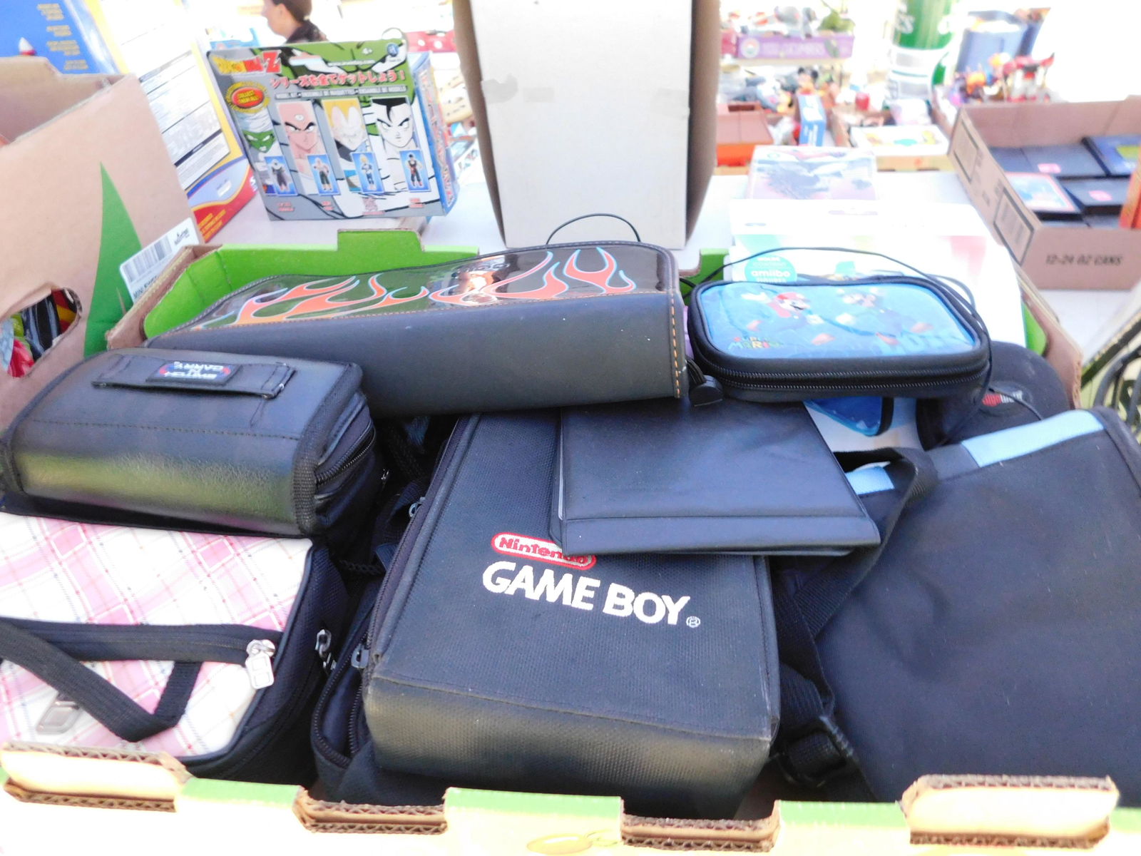 Lot of Gaming Travel Bags: Large lot of gaming travel bags. You are bidding at a live sale. Please read the terms and conditions. This sale will be broadcast live on sale day with full descriptions of each lot being sold, as we