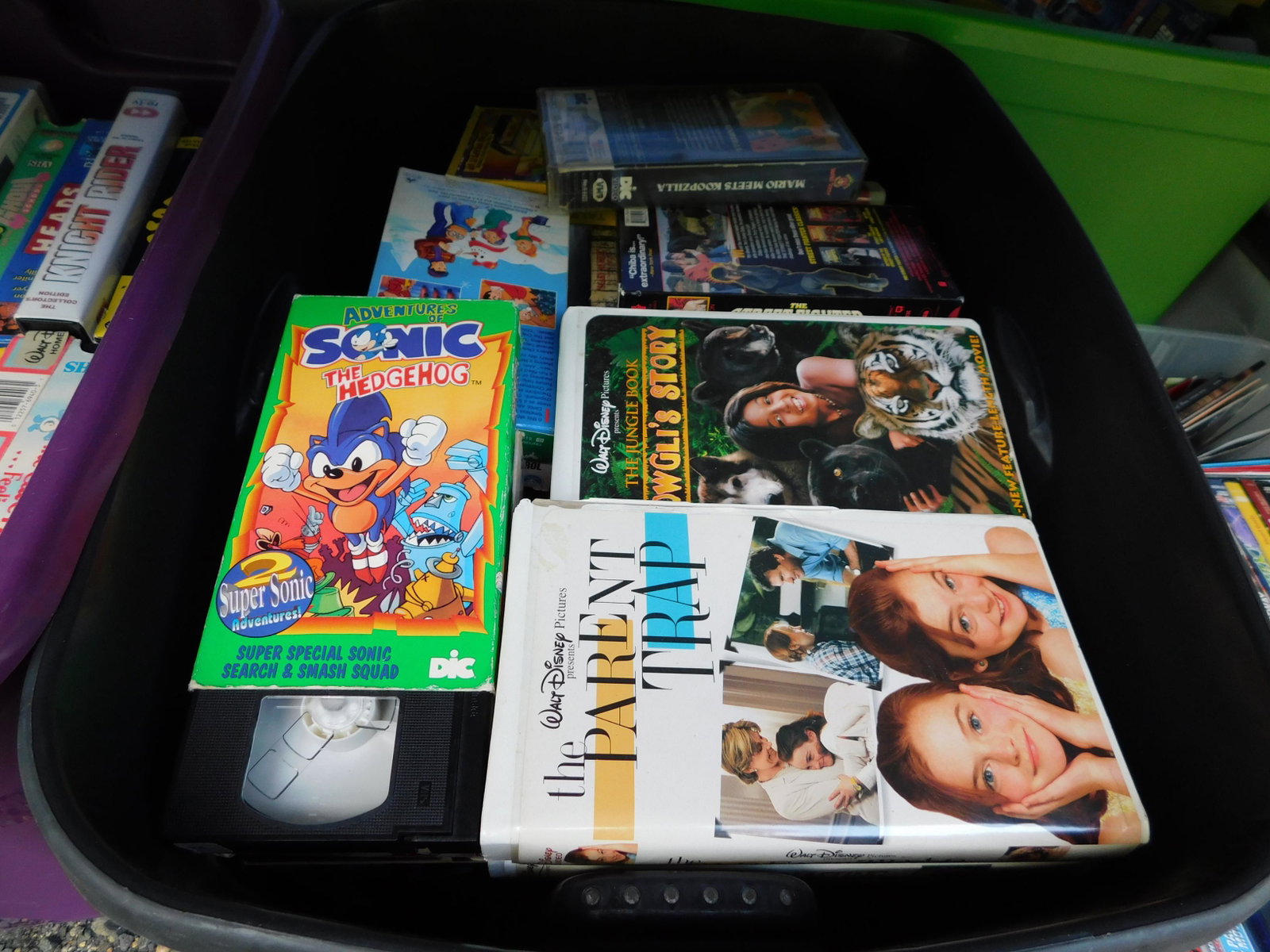 Lot of VHS: Large lot of VHS tapes. You are bidding at a live sale. Please read the terms and conditions. This sale will be broadcast live on sale day with full descriptions of each lot being sold, as well as vid