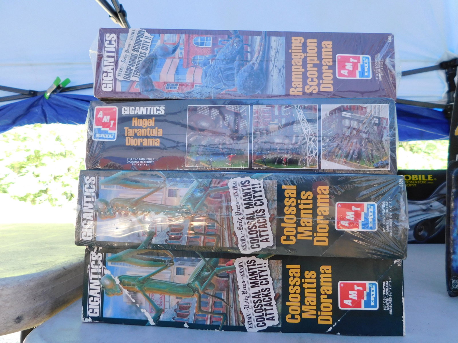 4 Ertl Gigantics Model Kits: 4 Ertl Gigantics model kits. All in original box, 3 sealed. May have some water damage. You are bidding at a live sale. Please read the terms and conditions. This sale will be broadcast live on sale d