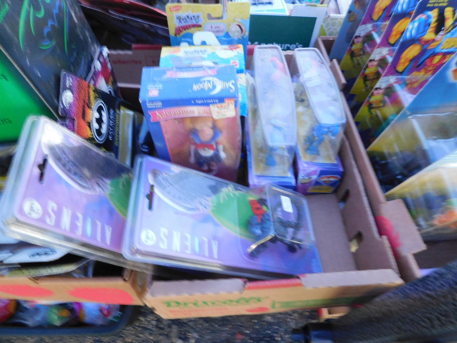 Lot of Various Figures: Lot of misc. figures including Aliens, Sailor Moon and more. May have some water damage. You are bidding at a live sale. Please read the terms and conditions. This sale will be broadcast live on sale 