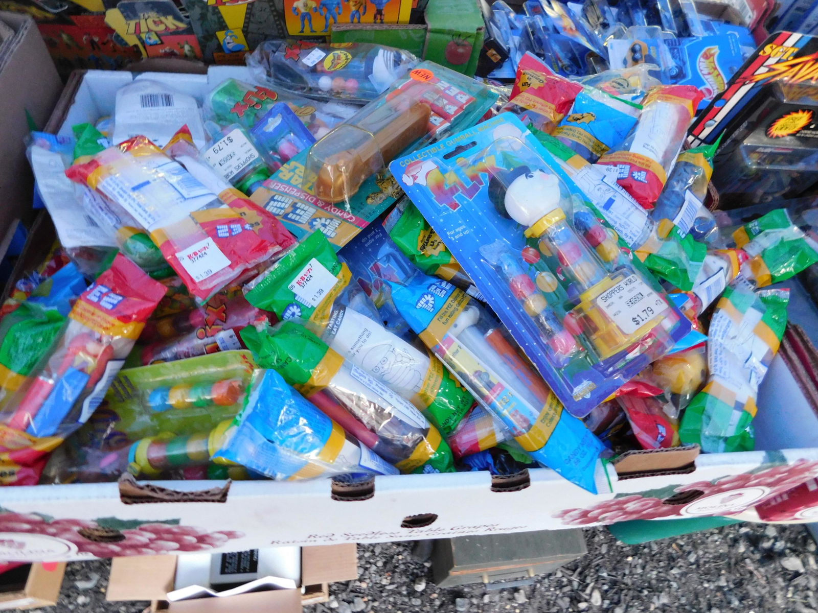 Pez Lot: Large lot of Pez. Most in original packaging. May have some water damage. You are bidding at a live sale. Please read the terms and conditions. This sale will be broadcast live on sale day with full d