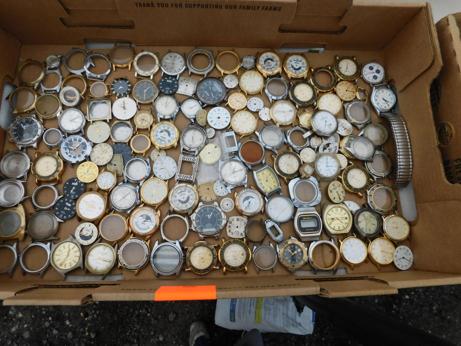 Lot of Wrist Watch Parts: Large lot of wrist watch parts and cases. You are bidding at a live sale. Please read the terms and conditions. This sale will be broadcast live on sale day with full descriptions of each lot being so