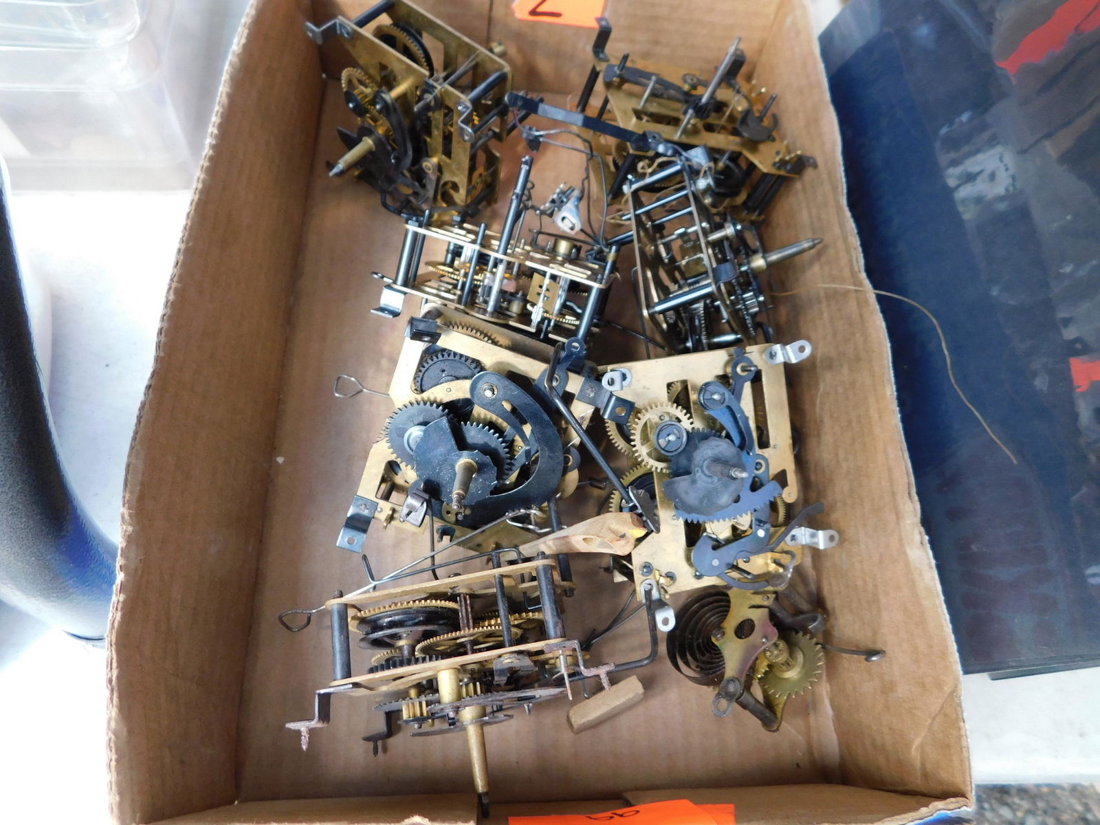 Lot of Clock Parts: Lot of clock parts. You are bidding at a live sale. Please read the terms and conditions. This sale will be broadcast live on sale day with full descriptions of each lot being sold, as well as video f