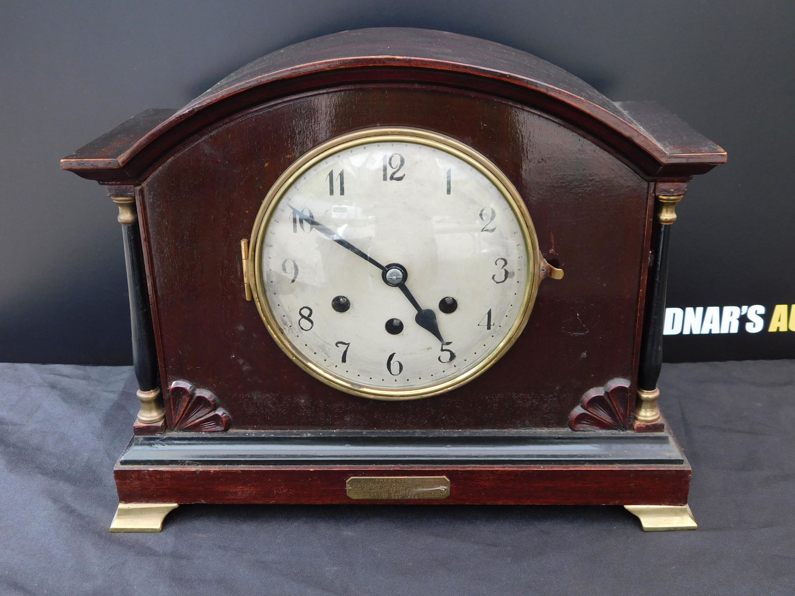 Mantle Clock: Mantle Clock Measures 11" x 14" wide. You are bidding at a live sale. Please read the terms and conditions. This sale will be broadcast live on sale day with full descriptions of each lot being sold,