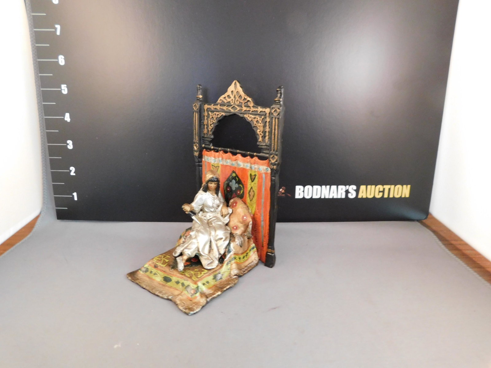 Bronze Cold Painted Vienna Style Egyptian Princess in: Bronze Cold Painted Vienna Style Egyptian Princess in Bed. Measures 5.5" tall x 3.5" wide. You are bidding at a live sale. Please read the terms and conditions. This sale will be broadcast live on sal