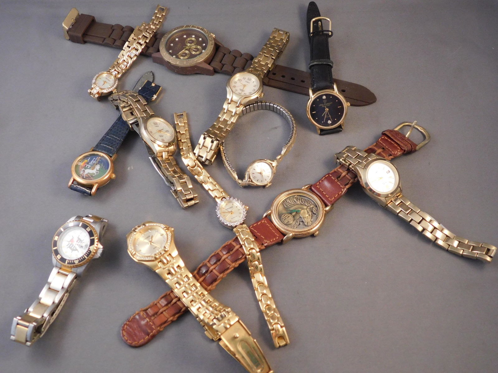 Lot of Wrist Watches: Lot of wrist watches. You are bidding at a live sale. Please read the terms and conditions. This sale will be broadcast live on sale day with full descriptions of each lot being sold, as well as video