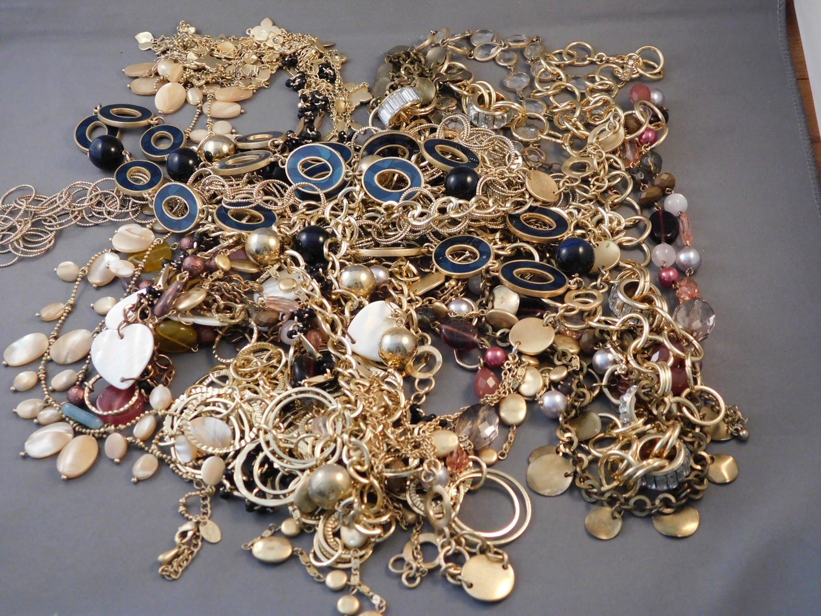 Lot of Costume Jewelry: Lot of costume jewelry. You are bidding at a live sale. Please read the terms and conditions. This sale will be broadcast live on sale day with full descriptions of each lot being sold, as well as vid