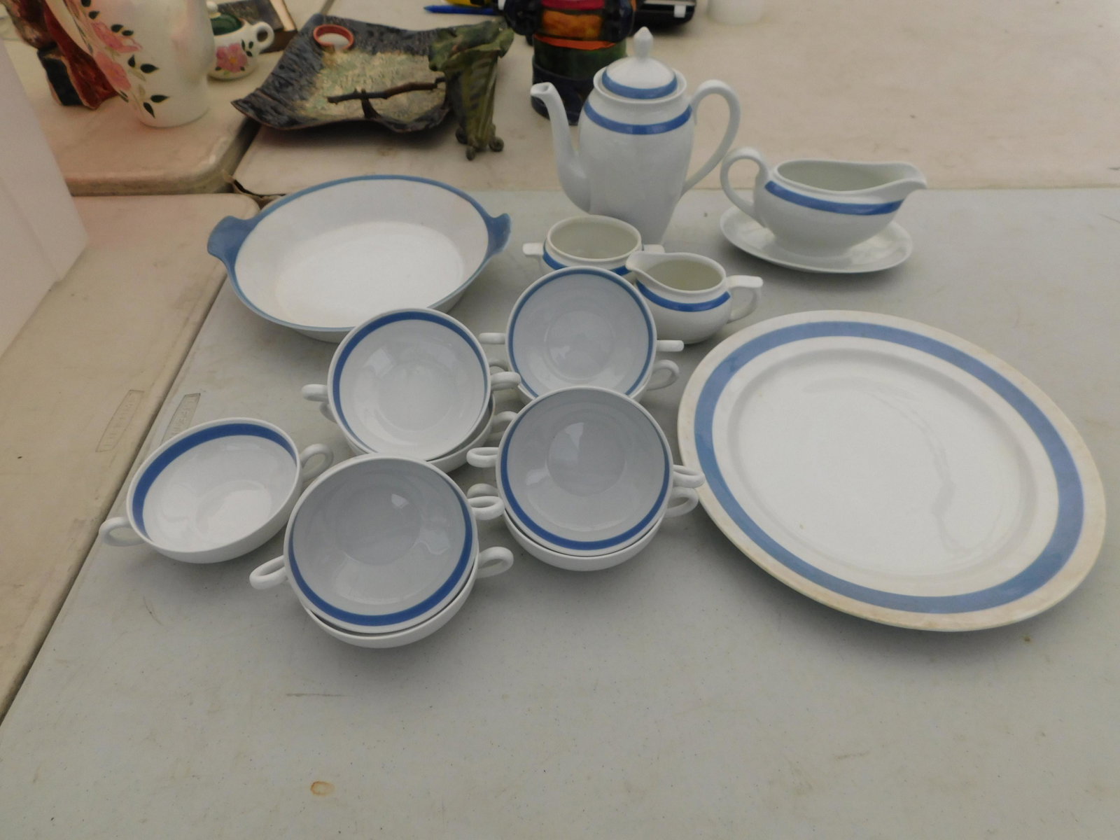 Arabia made in England: Arabia made in England partial cake set with teapot and double handled soups You are bidding at a live sale. You are bidding at a live sale. Please read the terms and conditions. This sale will be bro