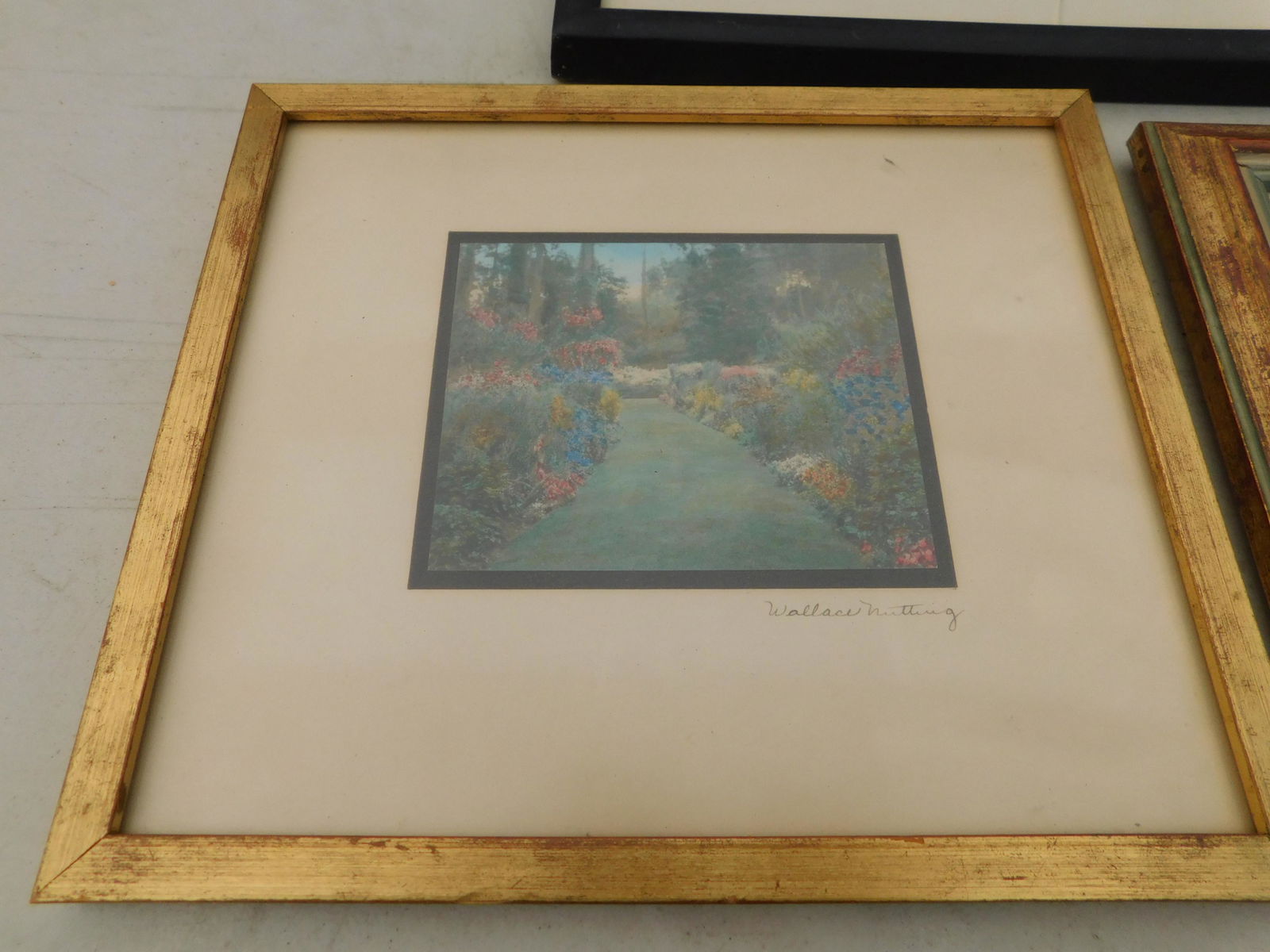 Framed Wallace Nutting Garden Scene: Framed Wallace Nutting Garden Scene. Hand Colored. Image measures 4" L x 3.5" T You are bidding at a live sale. Please read the terms and conditions. We are offering no contact pick up at our South Br