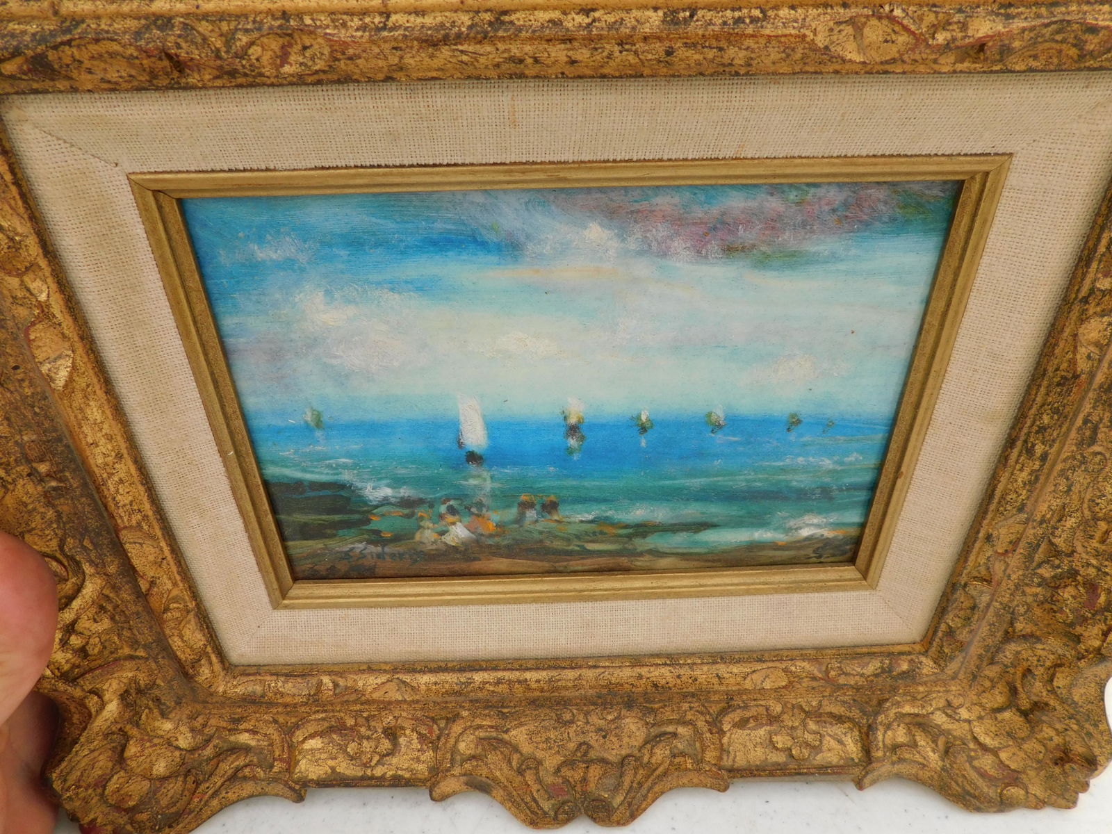 Oil on Masonite Beach and Ship Scene: Oil on Masonite. Signed lower left S. Siderls. Depicts a beach and ship scene. Image measures 5" L x 7" T You are bidding at a live sale. Please read the terms and conditions. We are offering no conta