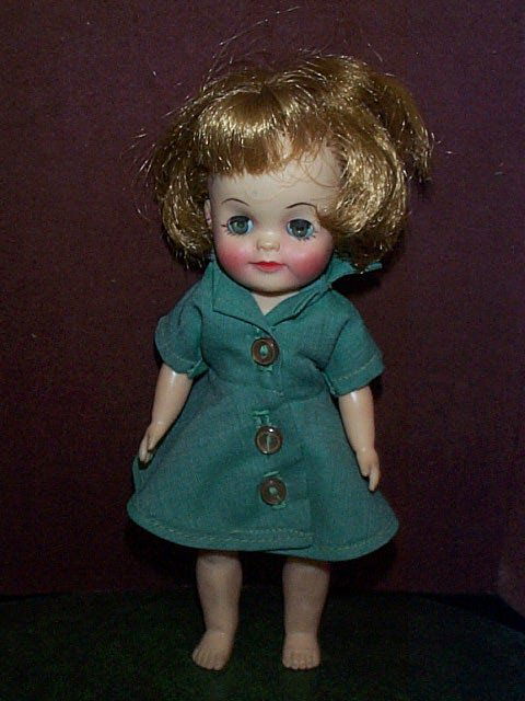 Effanbee 1965 Hard plastic jointed doll with sleep: Effanbee 1965 Hard plastic jointed doll with sleepy eyes Measures 8" tall Buyer to pay $15.00 if you live on the East Coast, Mid West buyer pays $20.00, West Coast buyer pays $25.00 shipping and handl