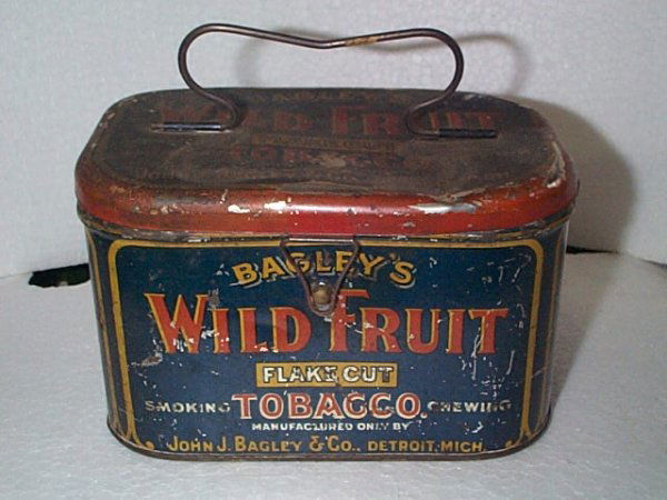 Vintage Advertising Tobacco tin/box Bagley's Wild: Vintage Advertising Tobacco tin/box Bagley's Wild fruit flake cut smoking and chewing tobacco Measures 4" tall by 7" long Buyer to pay $15.00 if you live on the East Coast, Mid West buyer pays $20.00,