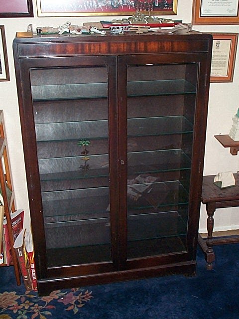 Depression walnut glass shelf bookcase with 2 gla