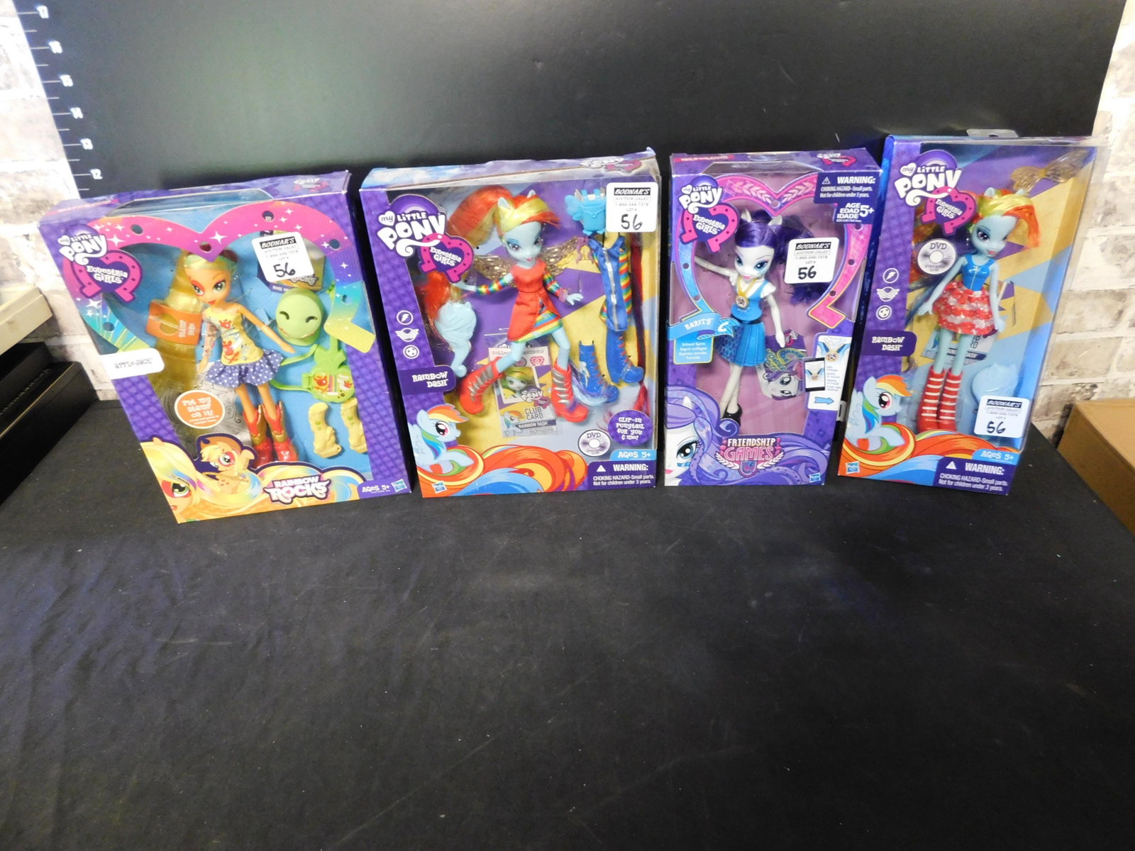 Lot of 4 My Little Pony Dolls: Lot of 4 My Little Pony Dolls. Included in this lot are Rarity, Rainbow Dash x 2, and Apple Jack. Made by Hasbro. You are bidding at a live sale. Please read the terms and conditions. This sale will b