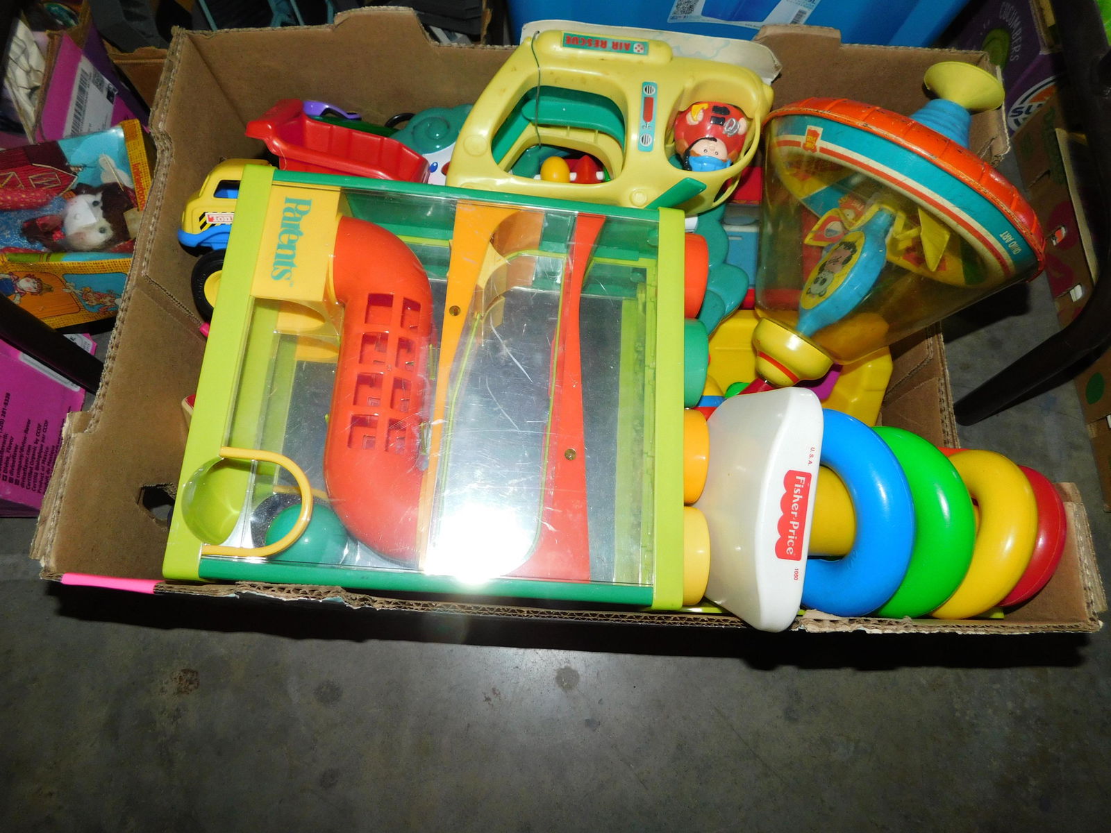 Box Lot of Fisher Price Toys: Box Lot of Fisher Price Toys. You are bidding at a live sale. Please read the terms and conditions. This sale will be broadcast live on sale day with full descriptions of each lot being sold, as well