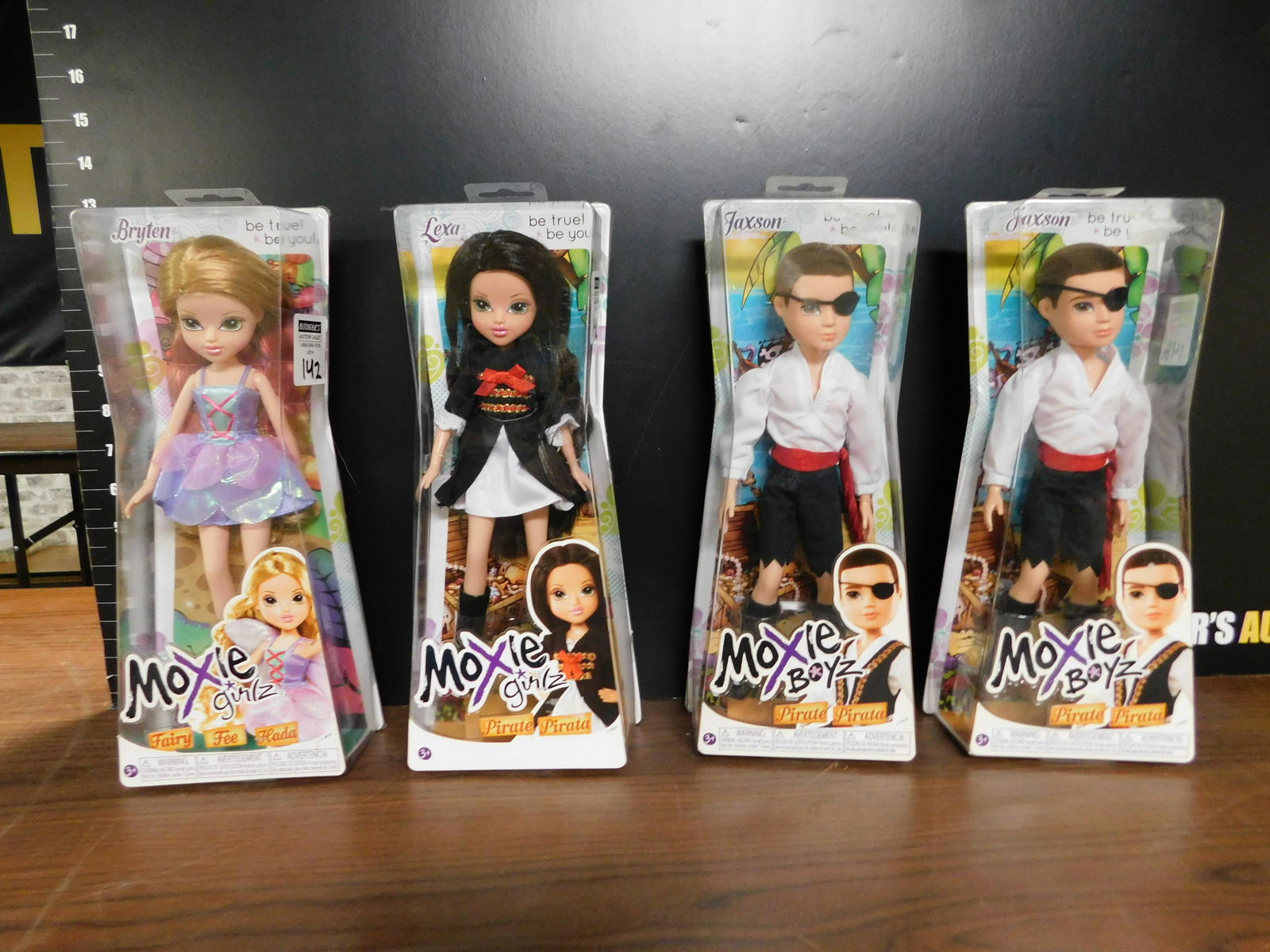 Lot of 4 Moxie Dolls: Lot of 4 Moxie Dolls. Included in this lot are 2 Jaxson, Lexa, and Bryten. Made by MGA Entertainment. You are bidding at a live sale. Please read the terms and conditions. This sale will be broadcast