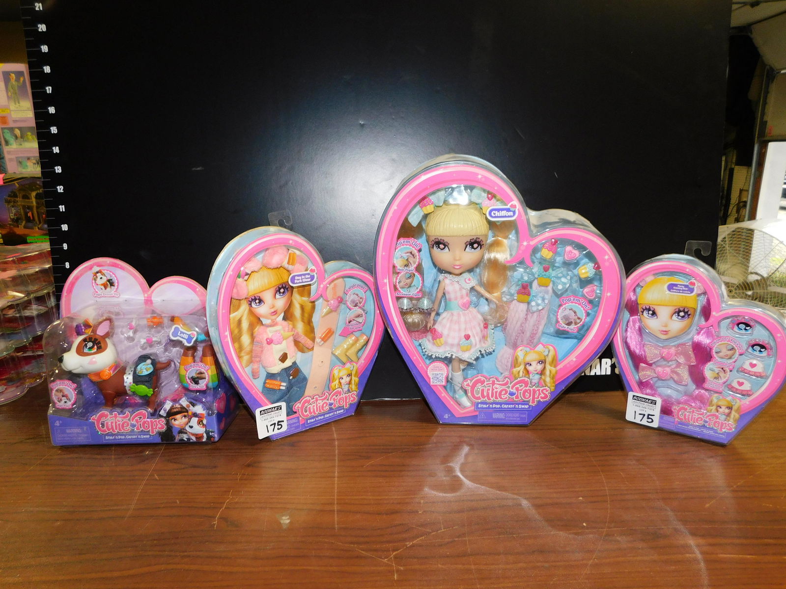 Cutie Pops Lot: Cutie Pops Lot of 4 items. Included in this lot are Chiffon Doll, Party Evening Hair, Day in the Park Wear, and Lolli the Dog. Made by Jada Toys. You are bidding at a live sale. Please read the terms
