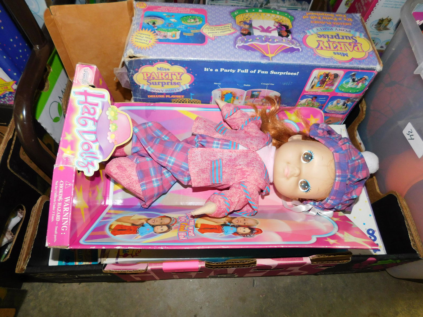 Box Lot of Dolls and Playsets: Box Lot of Dolls and Playsets. You are bidding at a live sale. Please read the terms and conditions. This sale will be broadcast live on sale day with full descriptions of each lot being sold, as well