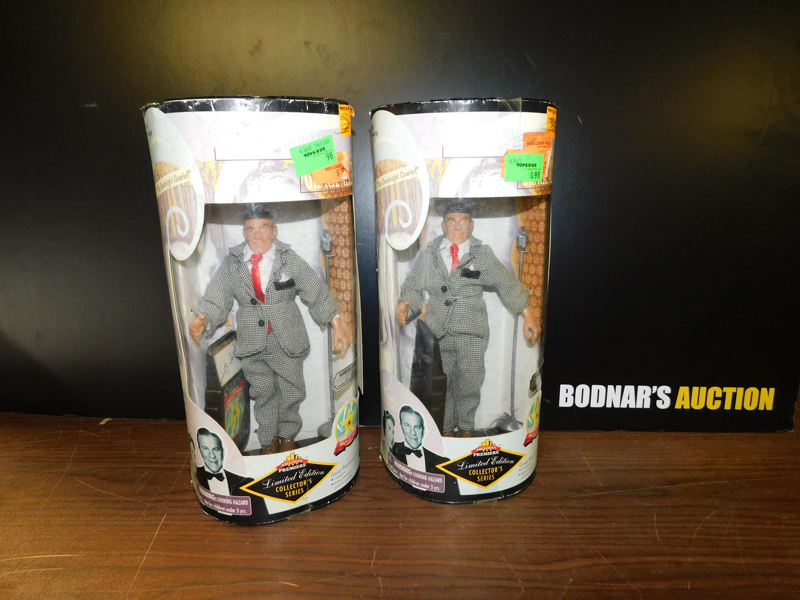 Lot of 2 George Burns Figures: Lot of 2 George Burns Figures in Box. You are bidding at a live sale. Please read the terms and conditions. This sale will be broadcast live on sale day with full descriptions of each lot being sold,
