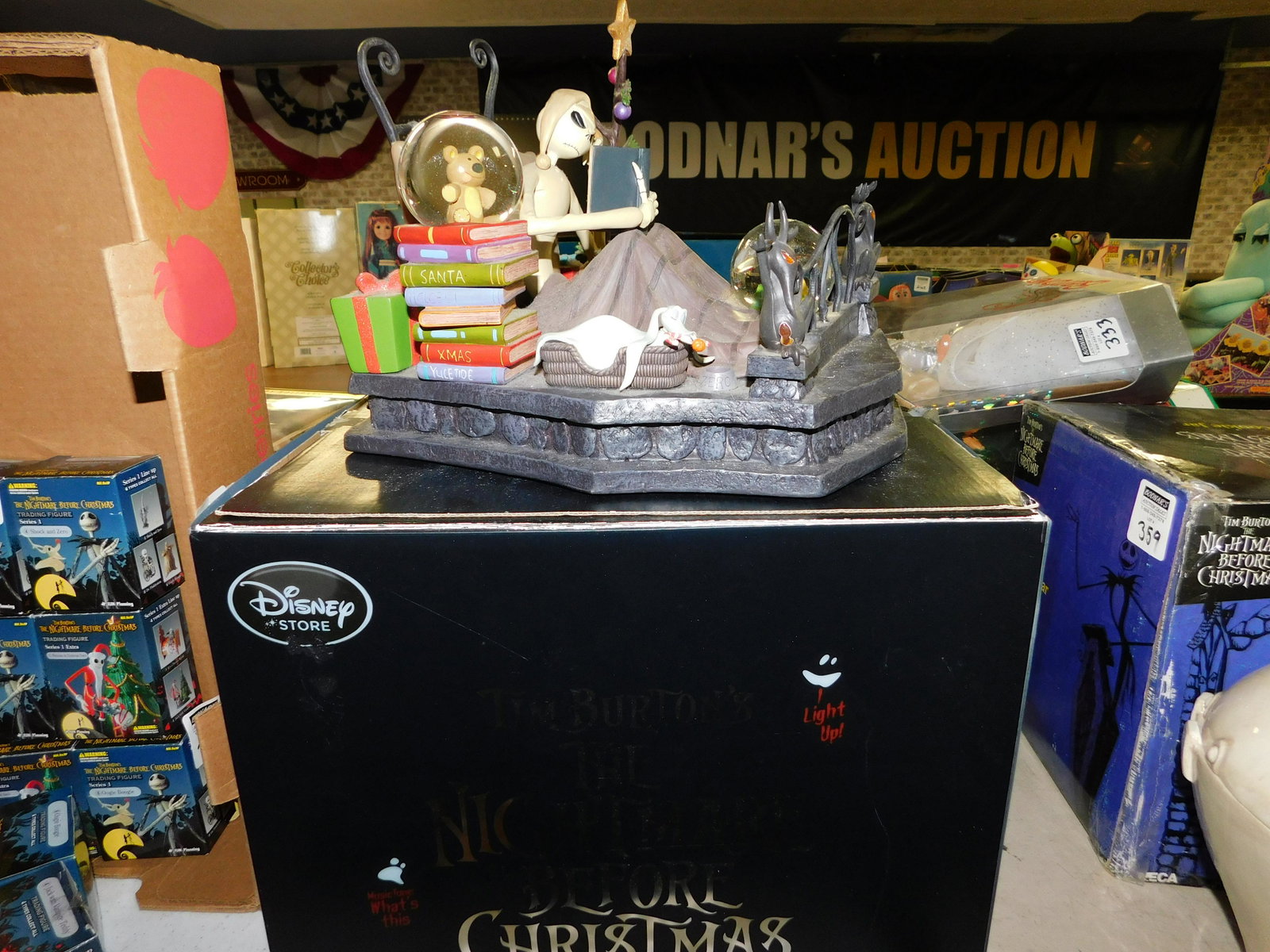 The Nightmare Before Christmas Snow Globe: The Nightmare Before Christmas Snow Globe - Disney Store. The gargoyle has 2 missing fingers and the bed frame needs a little glue. Comes with original box. You are bidding at a live sale. Please read
