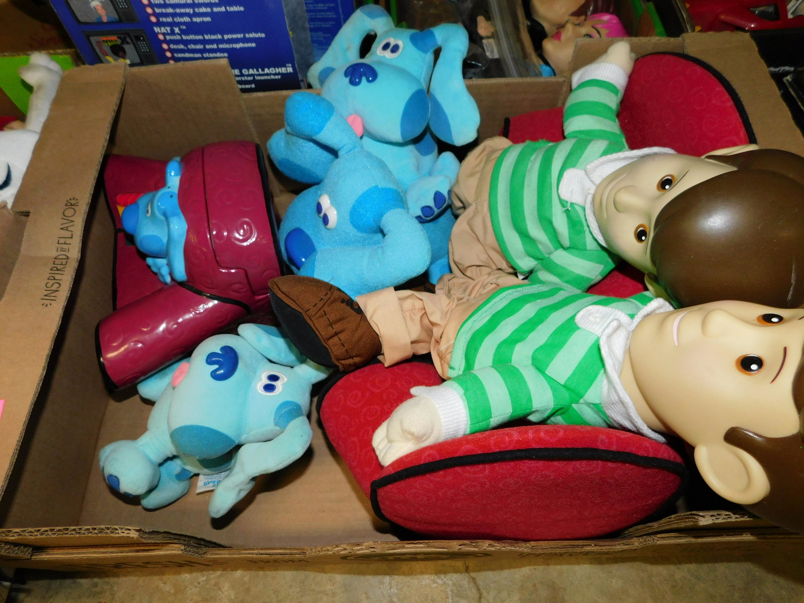 Box Lot of Blue's Clues: Box Lot of Blue's Clues Toys and a Cookie Jar. You are bidding at a live sale. Please read the terms and conditions. This sale will be broadcast live on sale day with full descriptions of each lot bei