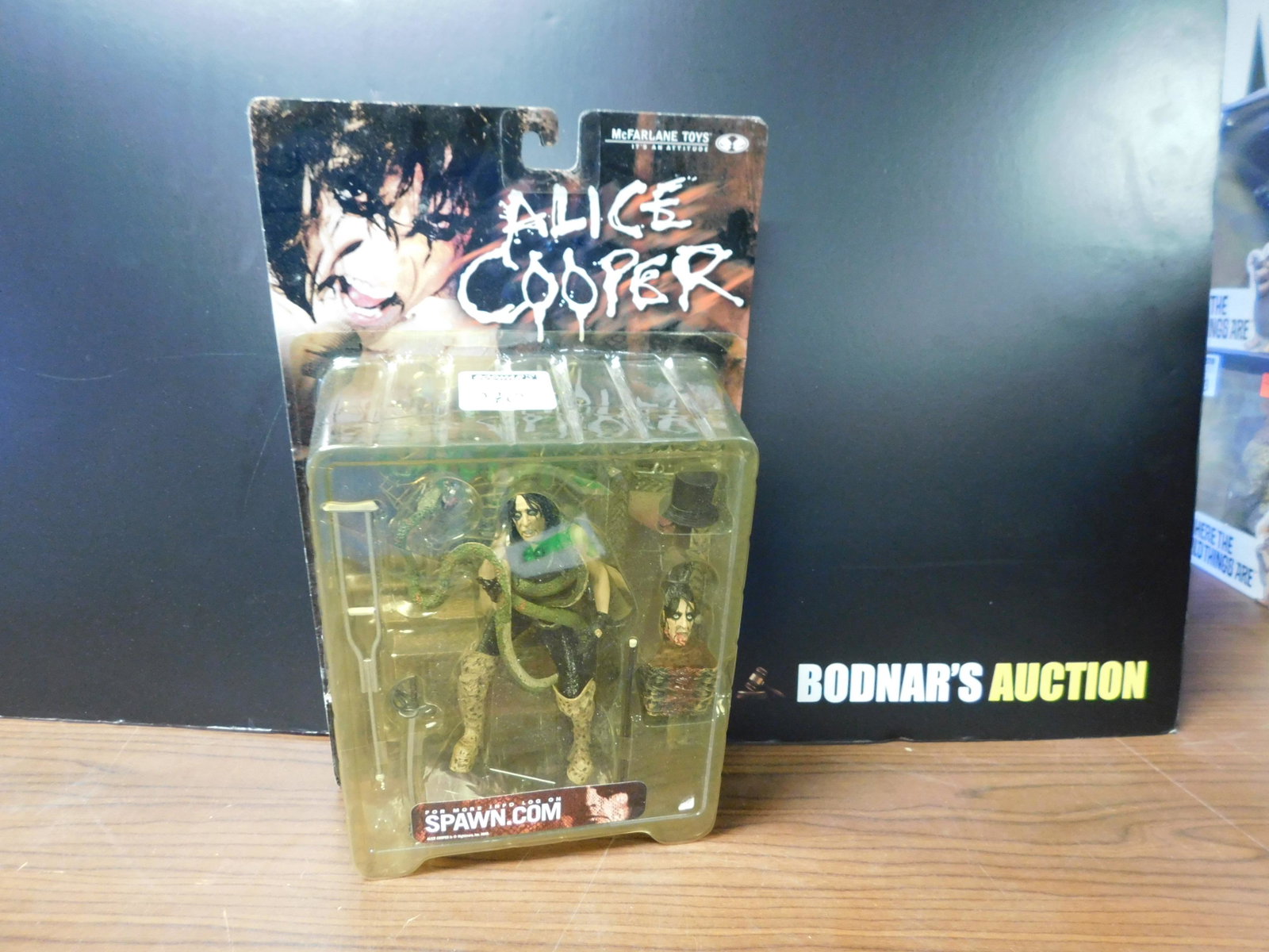 Spawn Alice Cooper Figure: Spawn Alice Cooper figure in original packaging. You are bidding at a live sale, please read the terms and conditions. We are offering contact-less pick ups at our South Brunswick location on the Frid