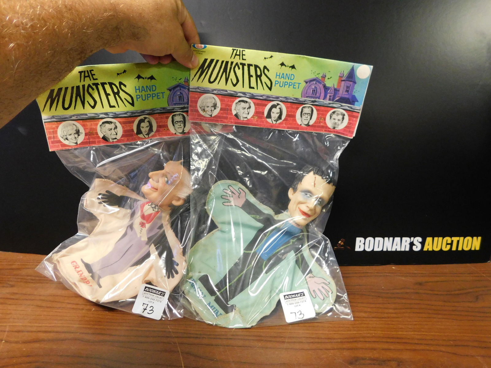 Vintage The Munsters Ideal Hand Puppets: Vintage The Munsters hand puppets by Ideal in original packaging. Includes Herman and Grandpa. Puppet measures approx. 10" tall x 8" wide. You are bidding at a live sale, please read the terms and con