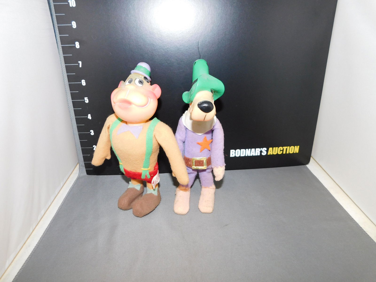 Ideal Magilla Gorilla and Droop Along Coyote: Ideal Magilla Gorilla and Droop Along Coyote. Both in very good. Measures approx. 7 1/2" tall. You are bidding at a live sale, please read the terms and conditions. We are offering contact-less pick u