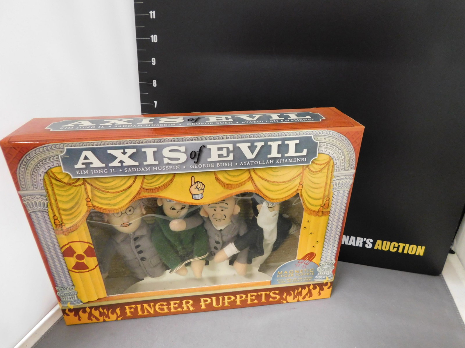Axis of Evil Finger Puppets: The Unemployed Philosophers Guild Axis of Evil Finger Puppets. Kim Jong Il, Saddam Hussein, George Bush, and Ayatollah Khamenei. You are bidding at a live sale, please read the terms and conditions. W