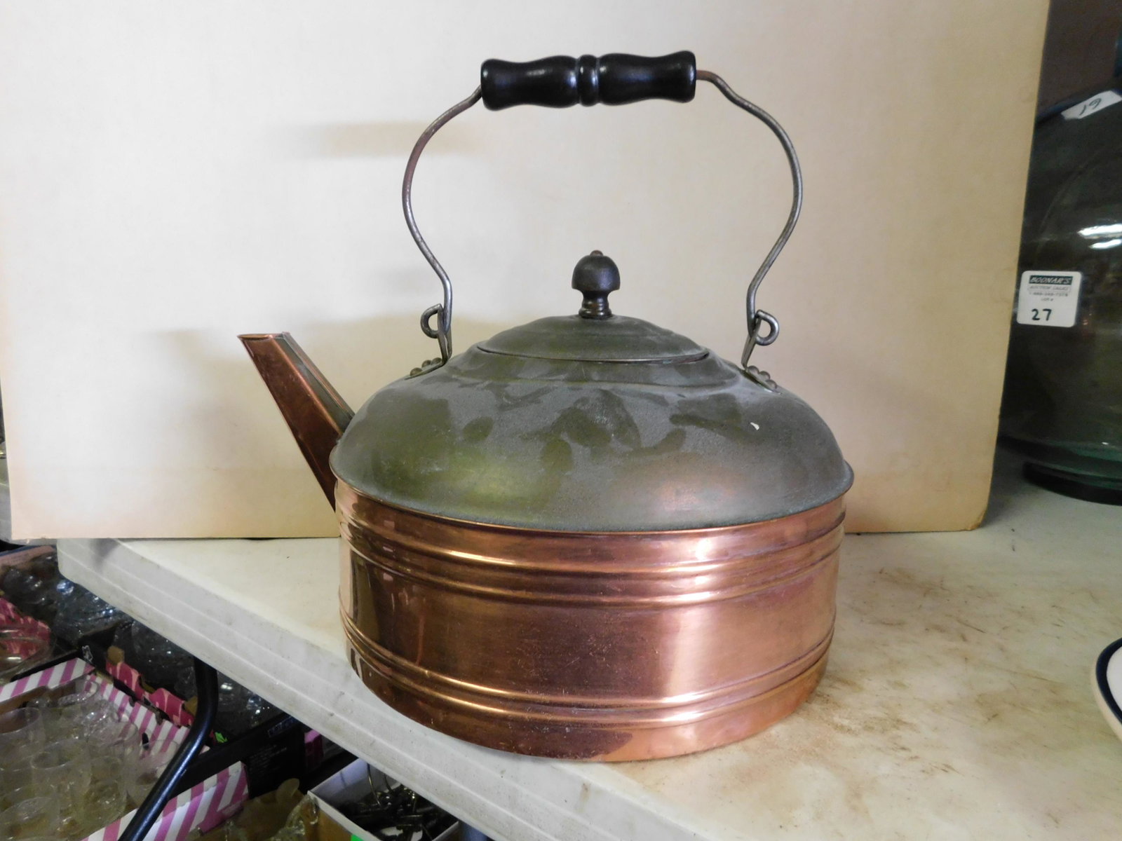Copper Teapot: Copper Teapot. Measures 12 L x 15" w. You are bidding at a live sale. Please read the terms and conditions. This sale will be broadcast live on sale day with full descriptions of each lot being sold, 