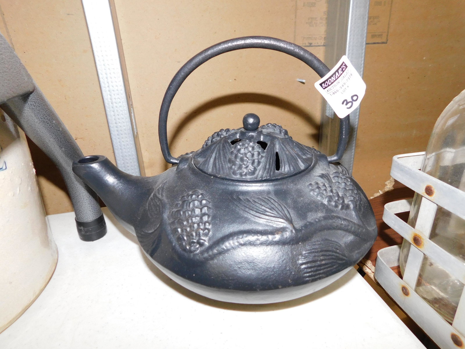 Cast Iron Humidifier: Cast Iron Humidifier. Measures 9" t x 11.5" l. You are bidding at a live sale. Please read the terms and conditions. This sale will be broadcast live on sale day with full descriptions of each lot bei