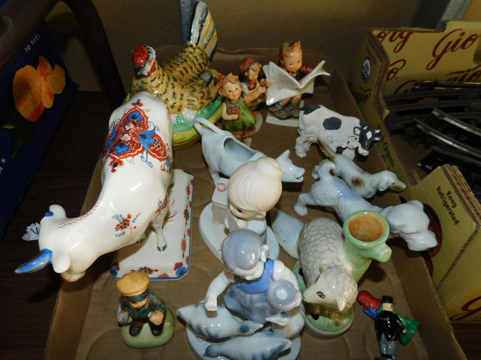 Box Lot of Figurines: Box Lot of Figurines. You are bidding at a live sale. Please read the terms and conditions. This sale will be broadcast live on sale day with full descriptions of each lot being sold, as well as video