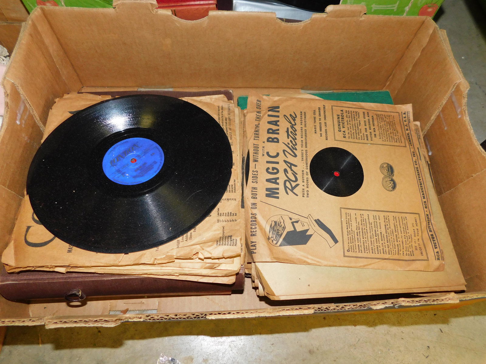 Box Lot of 78 Records: Box Lot of 78 Records. You are bidding at a live sale. Please read the terms and conditions. This sale will be broadcast live on sale day with full descriptions of each lot being sold, as well as vide