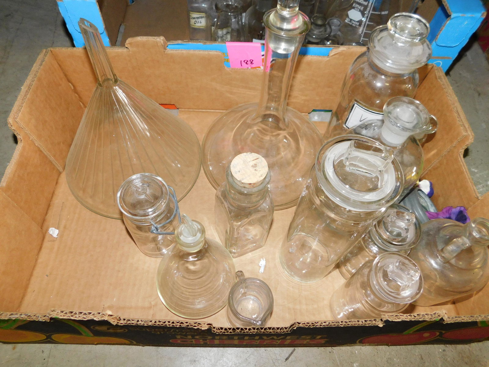 Box Lot of Apothecary Jars: Box Lot of Apothecary Jars. You are bidding at a live sale. Please read the terms and conditions. This sale will be broadcast live on sale day with full descriptions of each lot being sold, as well as