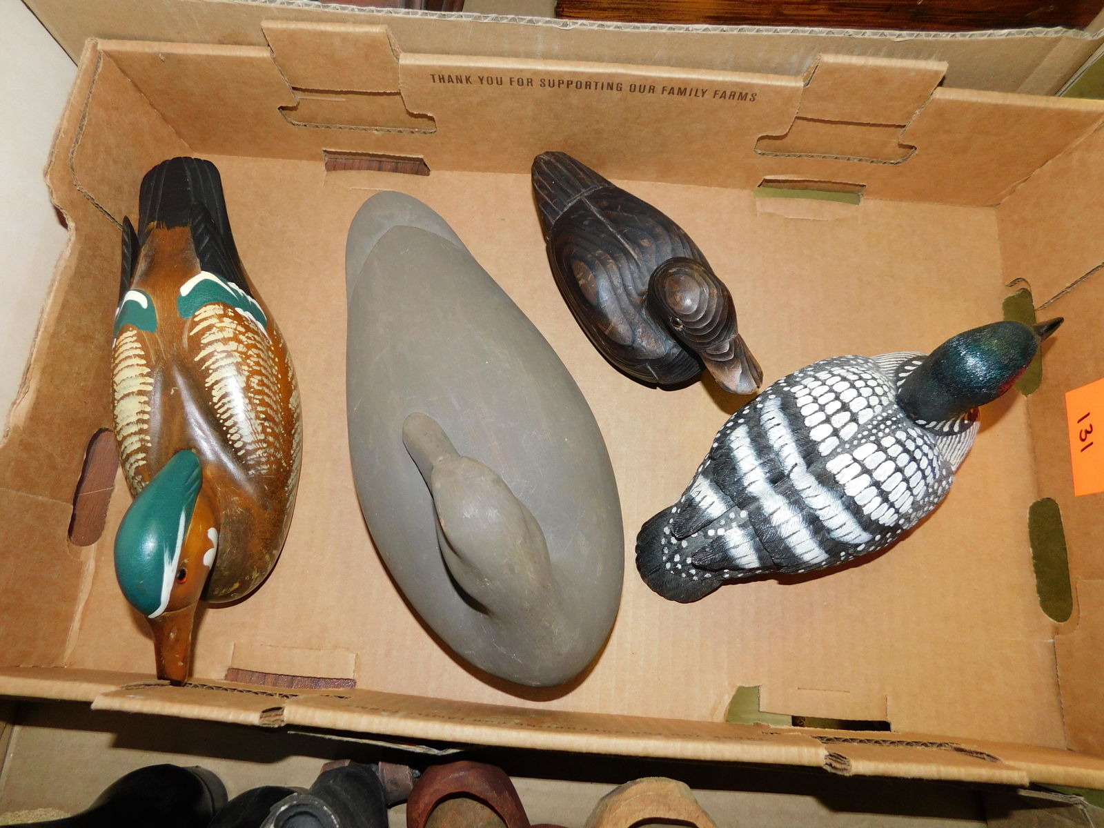 Box Lot Duck Decoys: Box Lot with Duck Decoys. You are bidding at a live sale. Please read the terms and conditions. This sale will be broadcast live on sale day with full descriptions of each lot being sold, as well as v