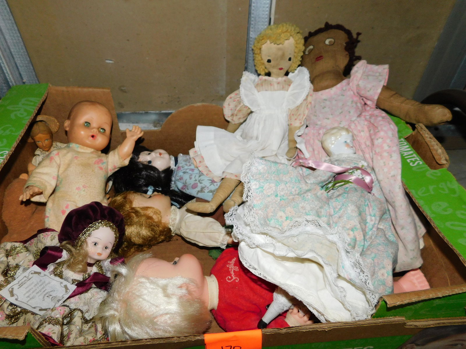 Box Lot of Dolls: Box Lot of Dolls. You are bidding at a live sale. Please read the terms and conditions. This sale will be broadcast live on sale day with full descriptions of each lot being sold, as well as video fee