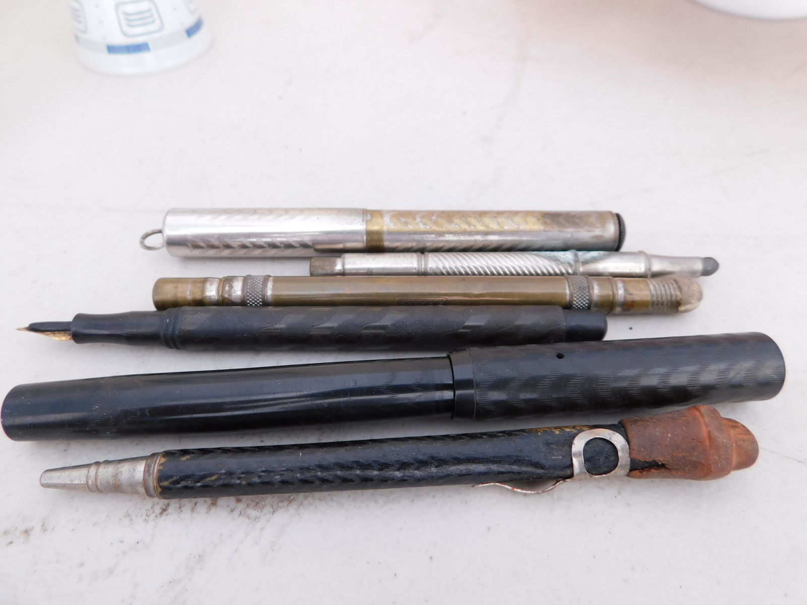 Lot of 6 Pencils and Pens: Lot of 6 Vintage Pencils and Pens. You are bidding at a live sale. Please read the terms and conditions. This sale will be broadcast live on sale day with full descriptions of each lot being sold, as