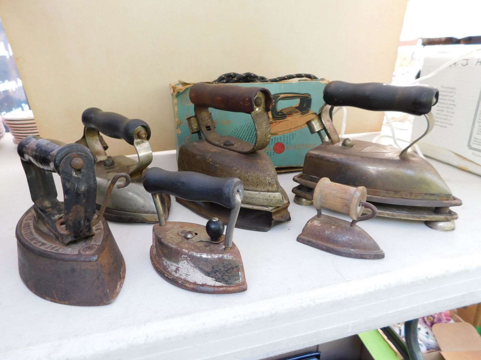 Lot of 7 Vintage Hand Irons: Lot of 7 Vintage Hand Irons. You are bidding at a live sale. Please read the terms and conditions. This sale will be broadcast live on sale day with full descriptions of each lot being sold, as well a