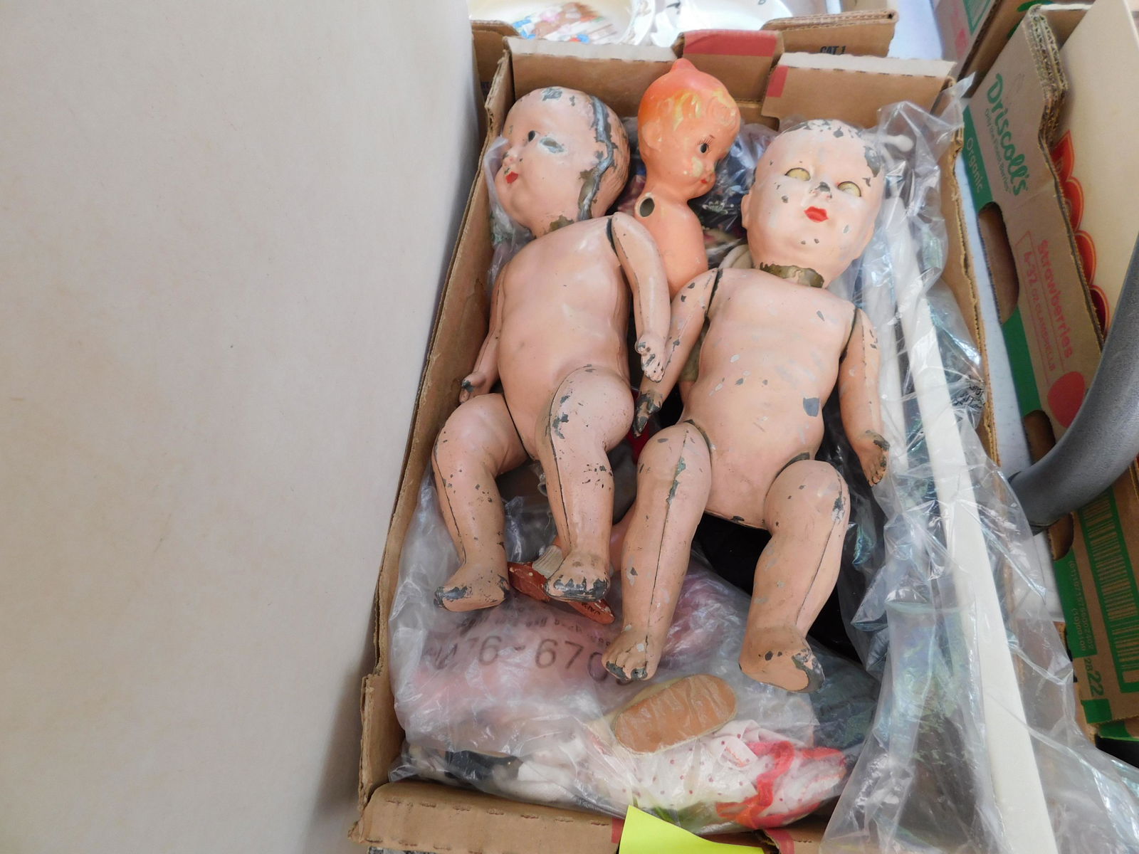 Box Lot of Dolls: Box Lot of Dolls. You are bidding at a live sale. Please read the terms and conditions. This sale will be broadcast live on sale day with full descriptions of each lot being sold, as well as video fee