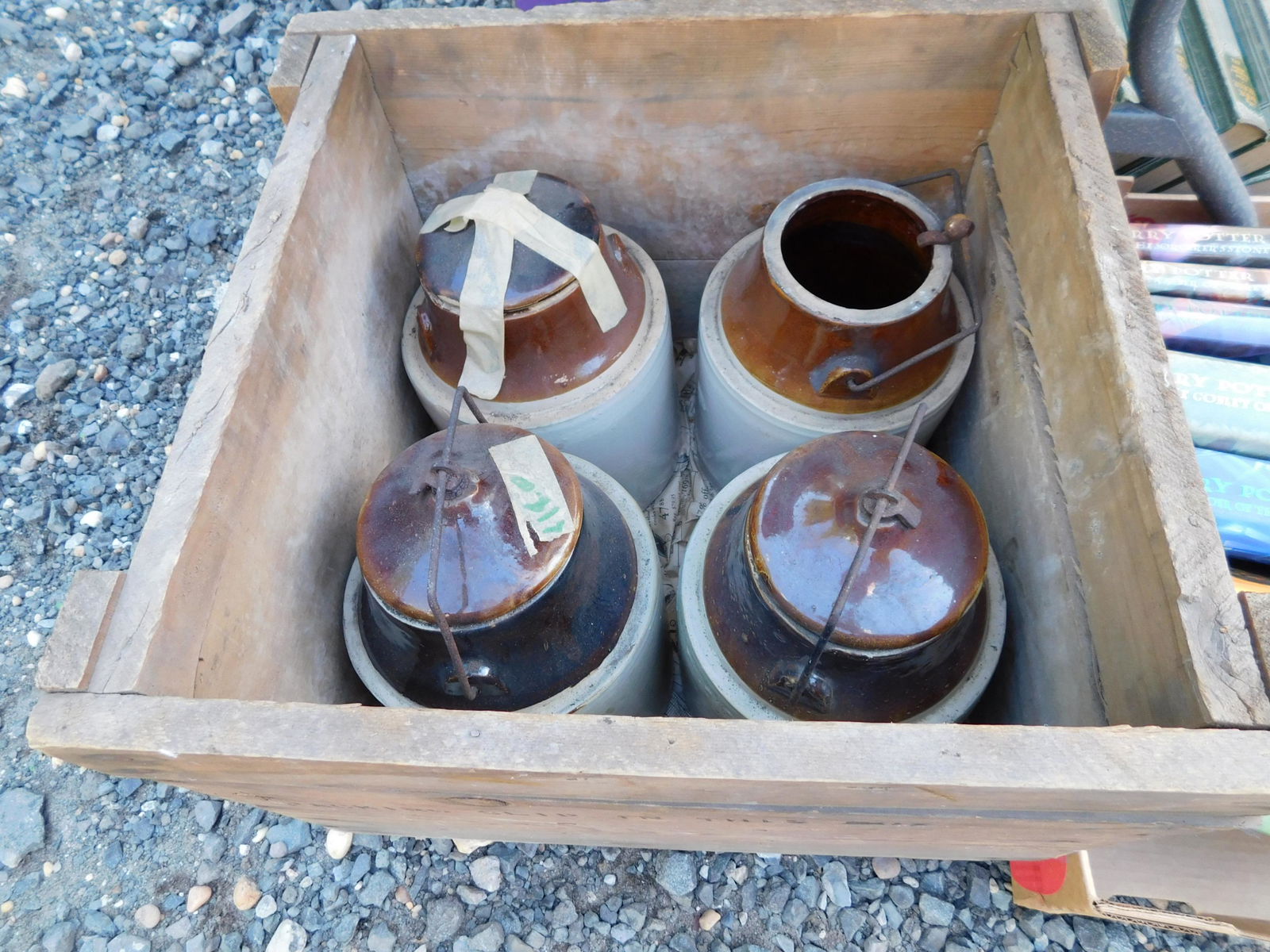 Crate with 4 Stoneware Pickle Jars: Crate with 4 Iron Stoneware Pickle Crocks. You are bidding at a live sale. Please read the terms and conditions. This sale will be broadcast live on sale day with full descriptions of each lot being s