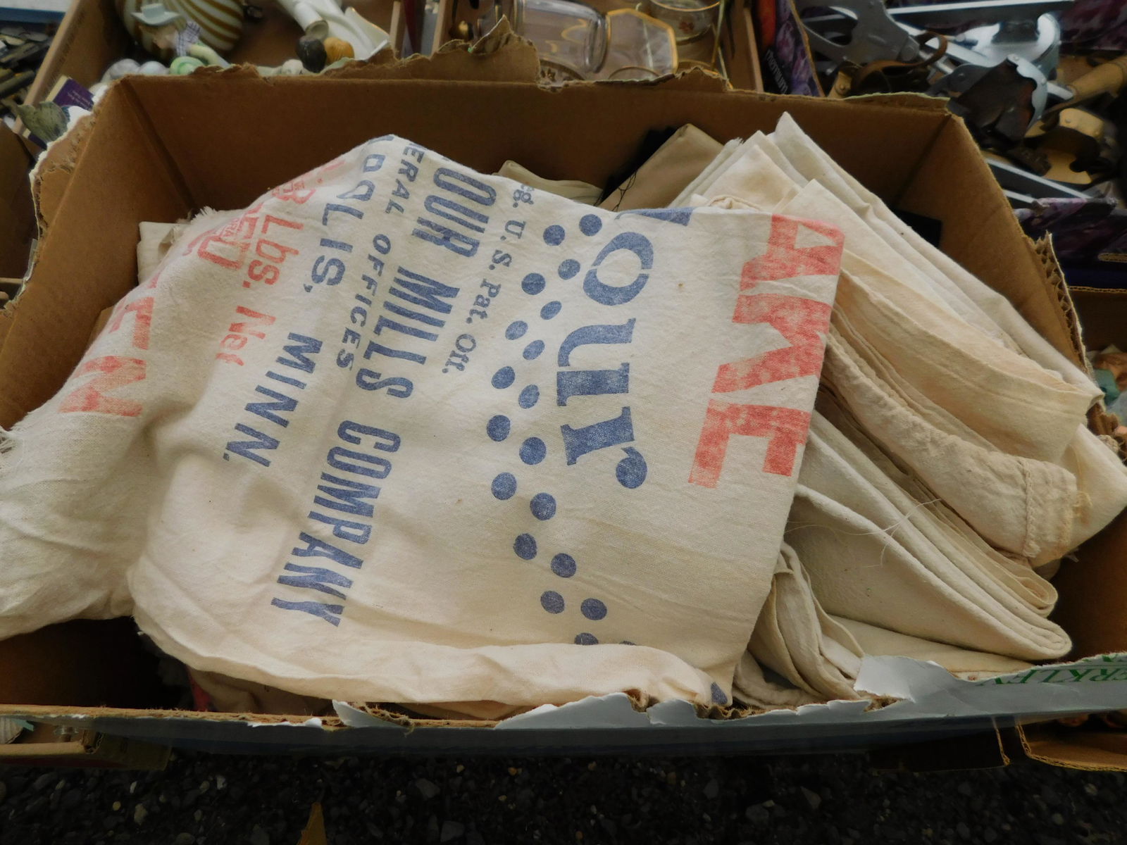 Box Lot with Vintage Flower Sacks: Large Box Lot with Vintage Flower Sacks. You are bidding at a live sale. Please read the terms and conditions. This sale will be broadcast live on sale day with full descriptions of each lot being sol