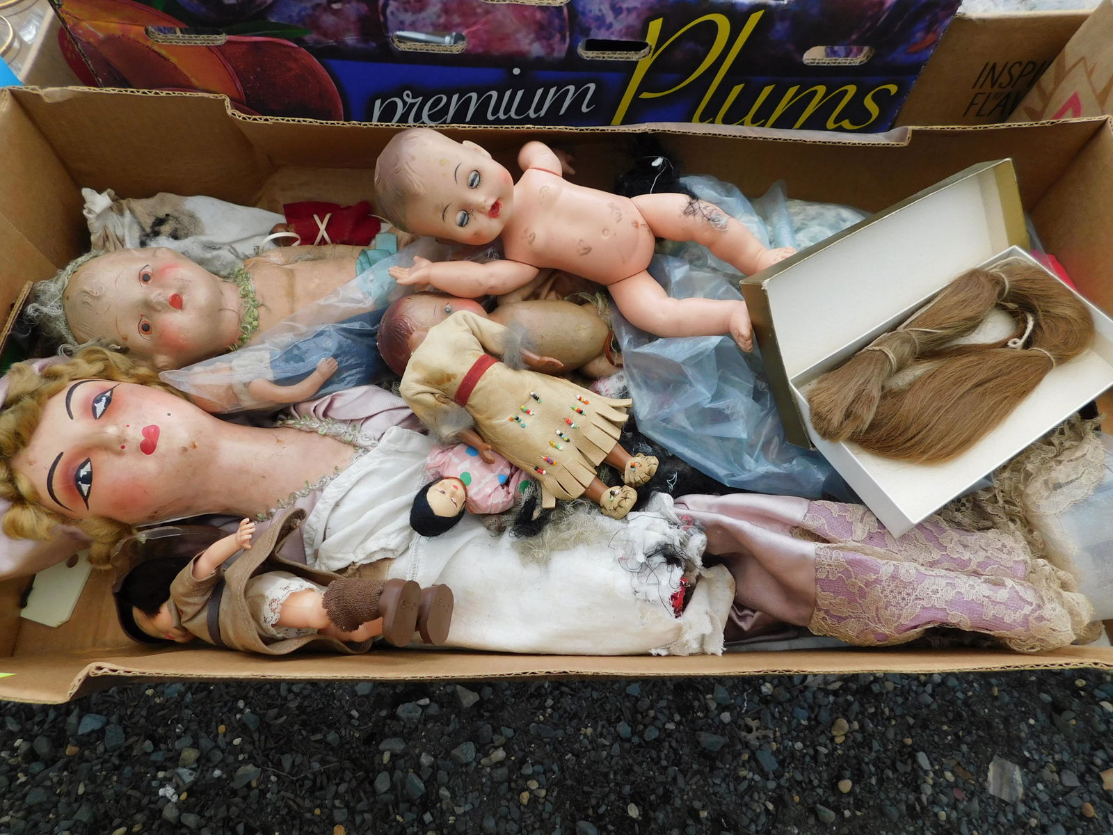 Box Lot of Dolls: Box Lot of Dolls. You are bidding at a live sale. Please read the terms and conditions. This sale will be broadcast live on sale day with full descriptions of each lot being sold, as well as video fee