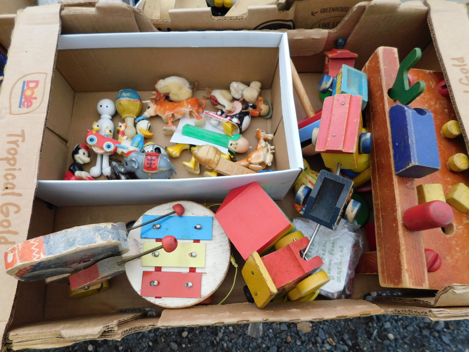 Box Lot of Vintage Toys: Box Lot of Vintage Toys. You are bidding at a live sale. Please read the terms and conditions. This sale will be broadcast live on sale day with full descriptions of each lot being sold, as well as vi