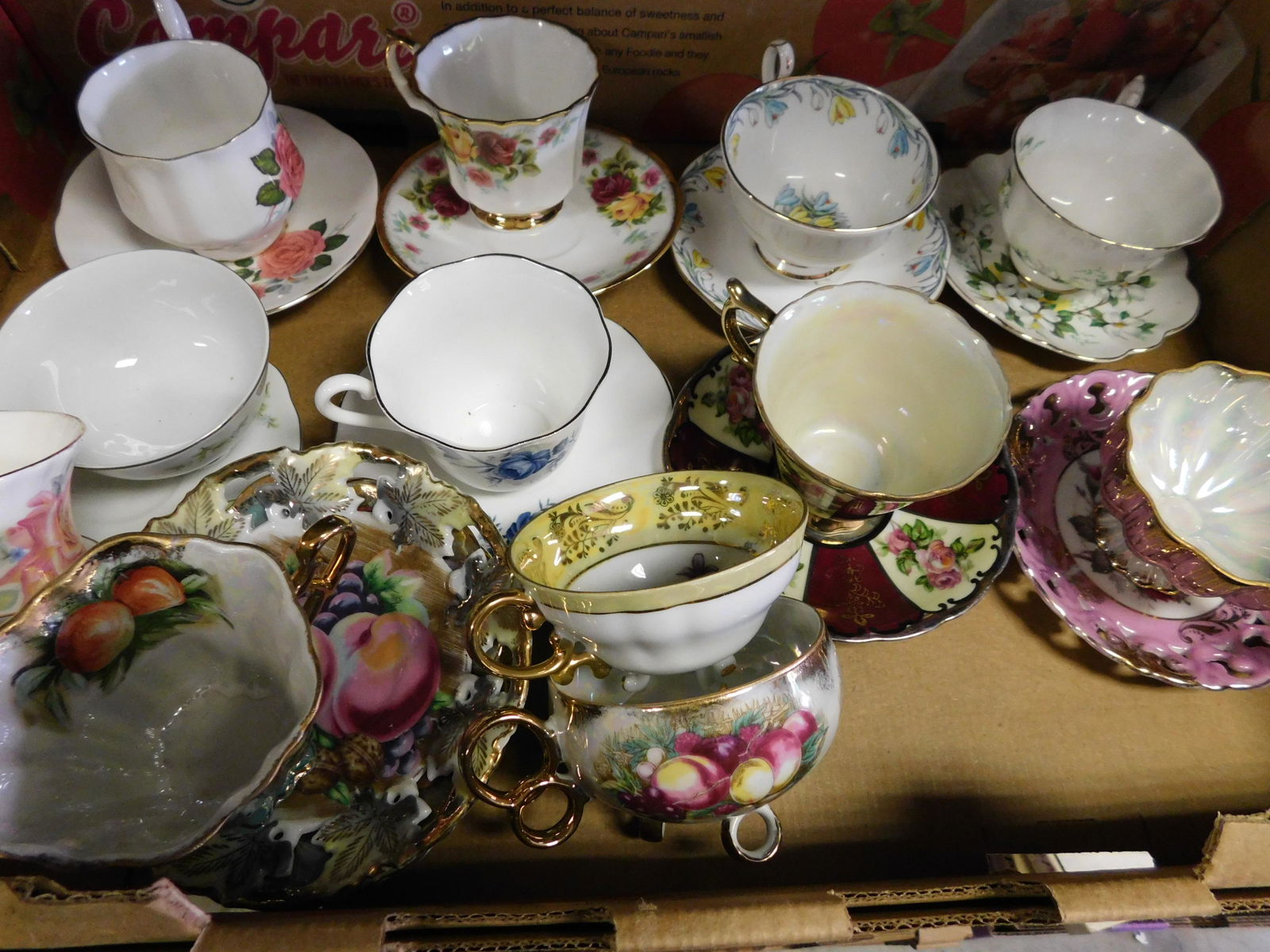 Box Lot of Cups and Saucers: Box Lot of Cups and Saucers. You are bidding at a live sale. Please read the terms and conditions. This sale will be broadcast live on sale day with full descriptions of each lot being sold, as well a