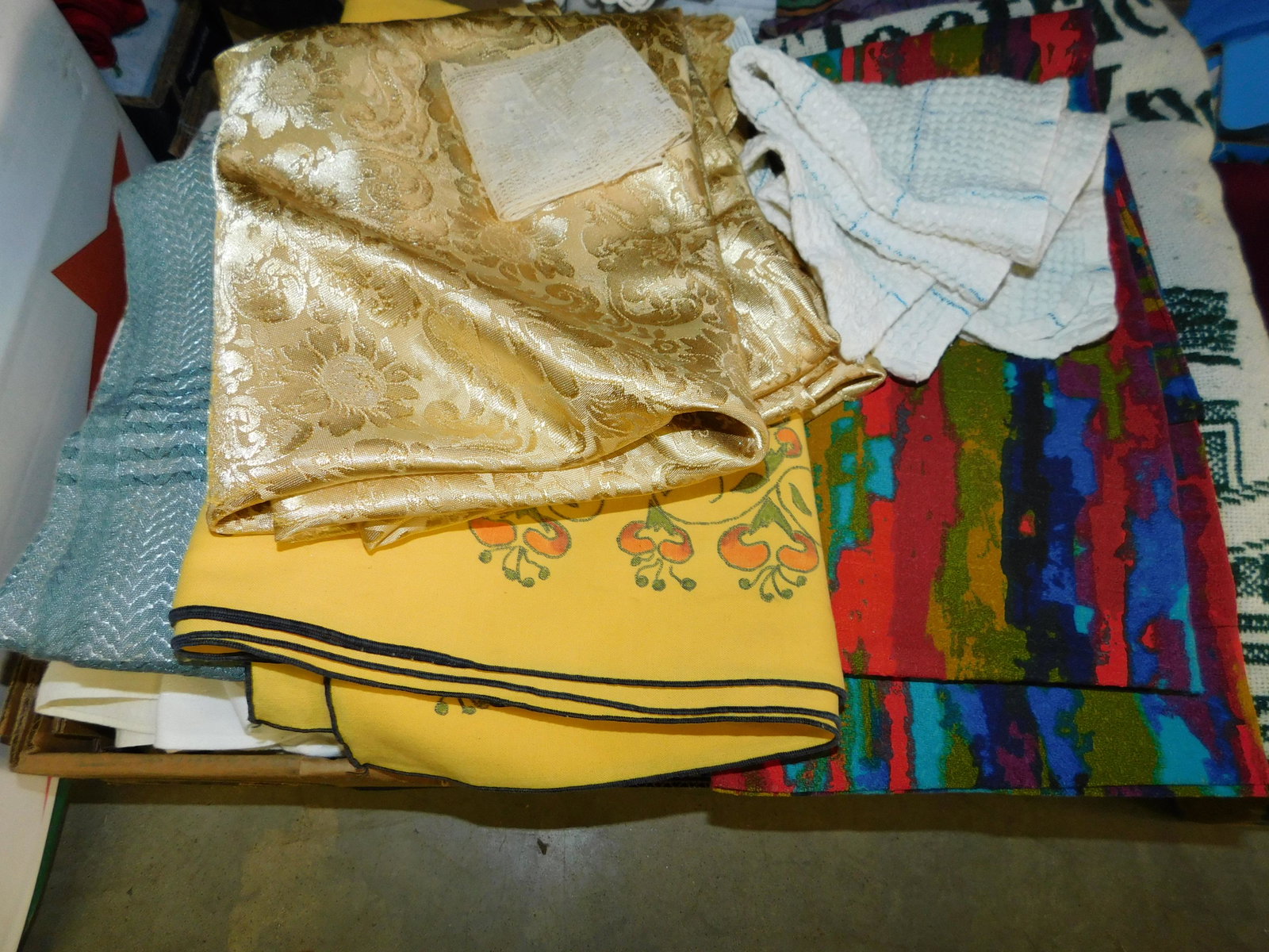 Box Lot of Textiles: Box Lot of Textiles. You are bidding at a live sale. Please read the terms and conditions. This sale will be broadcast live on sale day with full descriptions of each lot being sold, as well as video