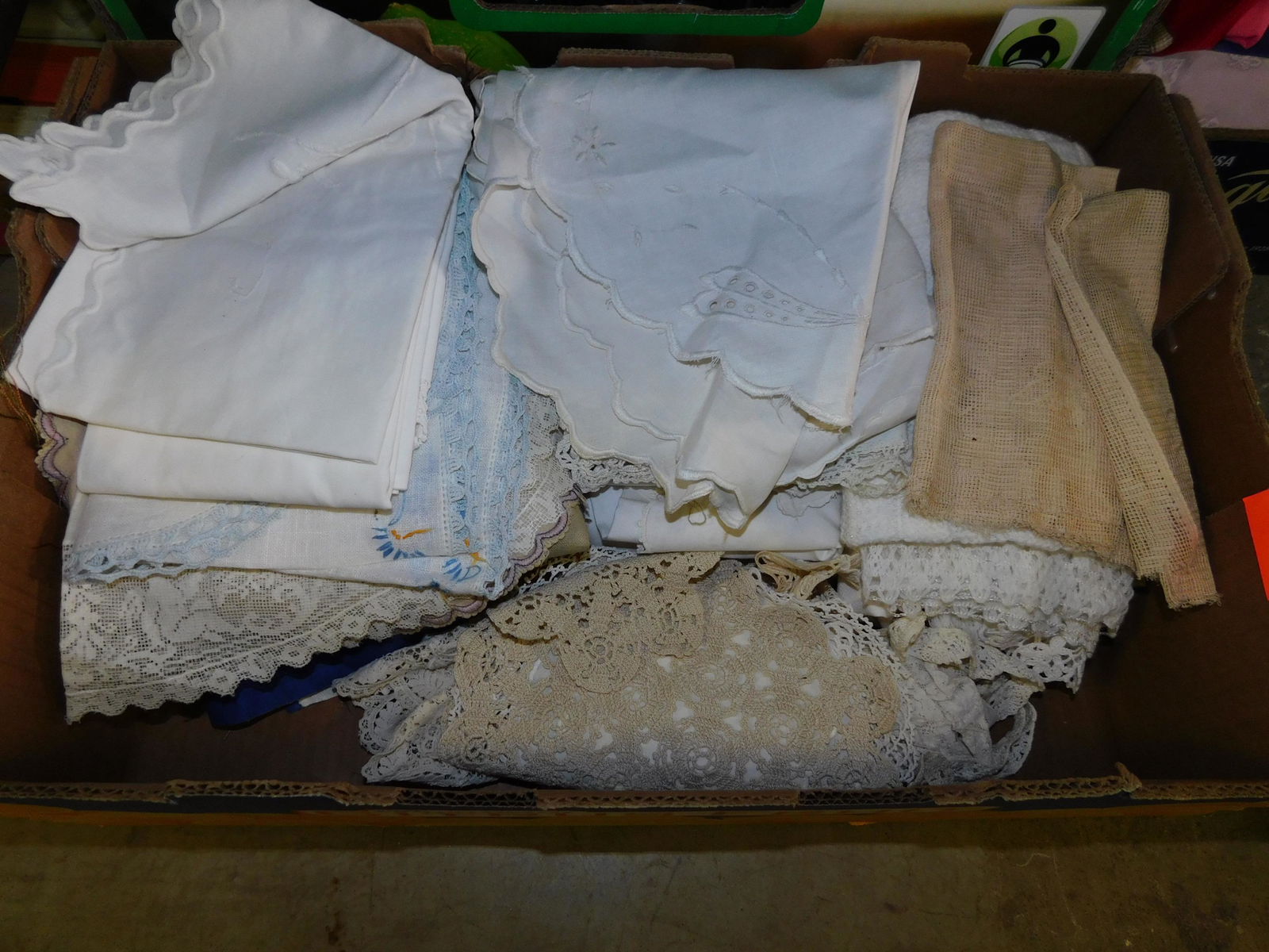 Box Lot of Textiles: Box Lot of Textiles. You are bidding at a live sale. Please read the terms and conditions. This sale will be broadcast live on sale day with full descriptions of each lot being sold, as well as video